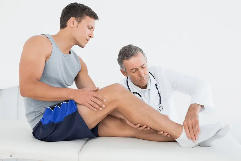 side-view-young-man-getting-his-leg-examined Knee Replacement Fail