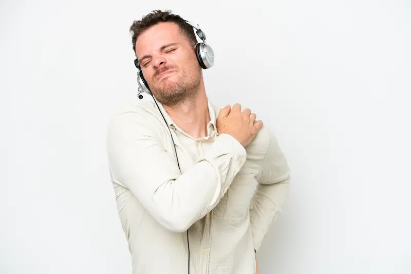 telemarketer-caucasian-man-working-with-headset-isolated-white-background-suffering-from-pain-shoulder-having-made-effort (1) My Shoulder Sound